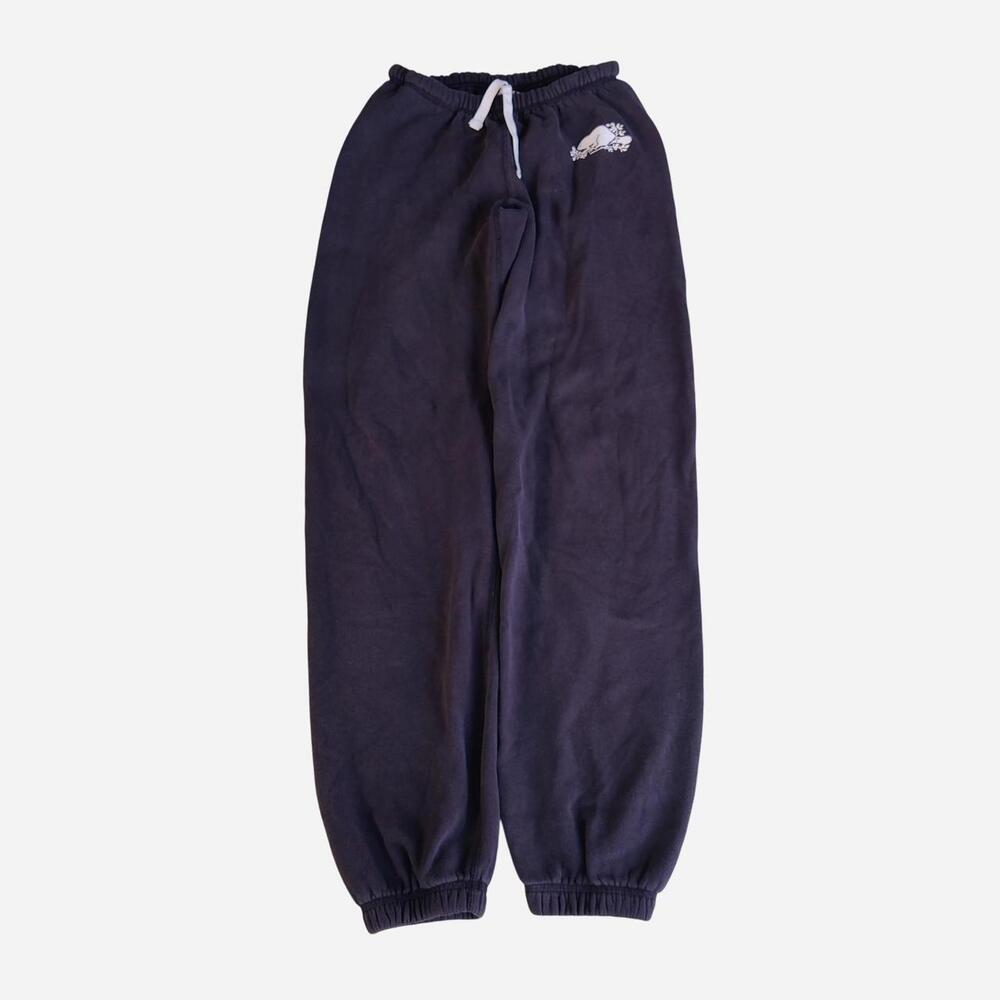 black Roots sweatpants with a loose fit